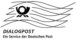 Frankiervermerk_Dialogpost Holzstempel mit Stempelabdruck DIALOGPOST (Frankiervermerk) auf einer Kuvertierhülle